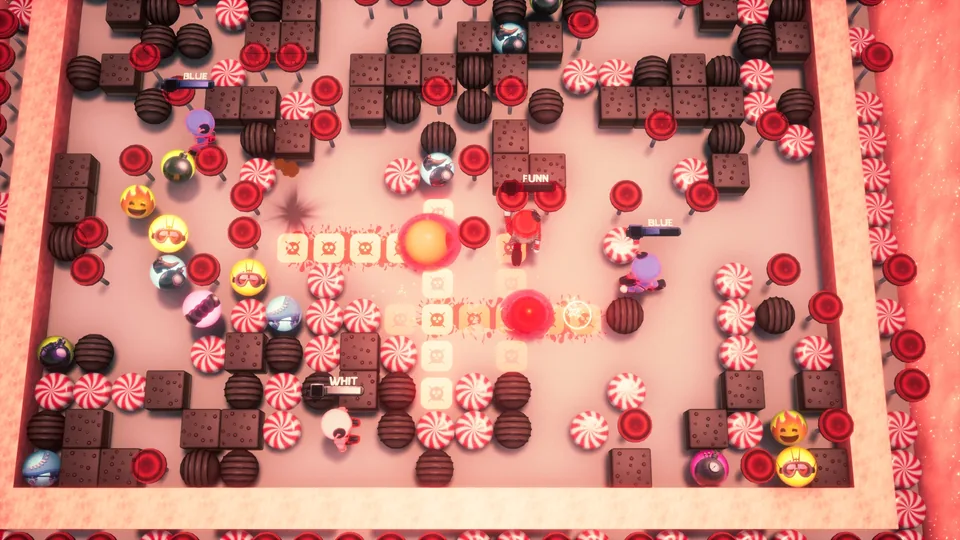 Top-down Atomic Blastman match in the Candy Land arena with bombs exploding