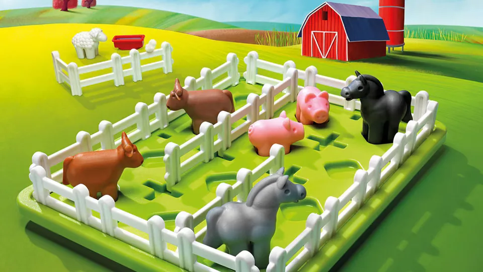 The original Smart Farmer board game with toy animals and fences